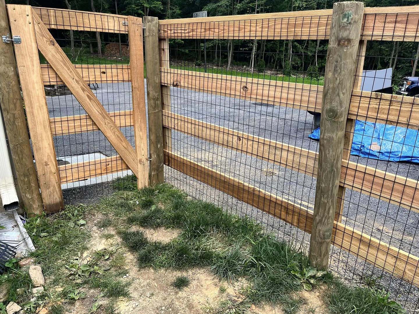 Holtwood Pennsylvania Board Fence With Wire Mesh